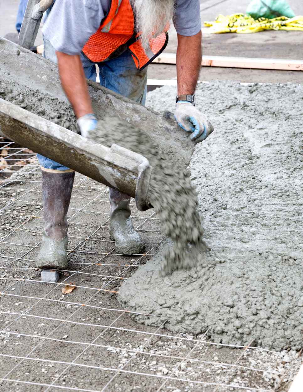 Man pouring cement from truck